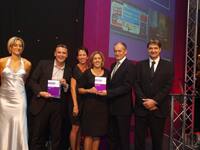 An image of us accepting the Travolution Award